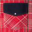 The pearl snap button on the flap pocket.