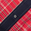The pearl snap button on the stitched placket.
