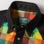 A close-up of the button up collar on the Nicholas Daley Checkered Madras Western shirt with pearl snap buttons.