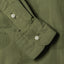 The sleeve on the Olive Dobby Dot
shirt with two white chalk buttons.