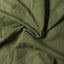 The texture of the fabric on the Olive Dobby Dot shirt.