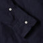 The sleeve on the Navy Dobby Dot
shirt with two white chalk buttons.
