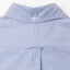 The back of the blue oxford button down shirt with a locker loop and a white buttoned collar.