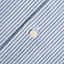 The button on the  placket of the Blue Stripe Linen Camp Shirt.