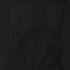 One of the flap pockets with another flap pocket on the other side of the shirt.