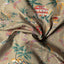 The texture of the fabric of the Tan Hawaiian Print Camp Shirt.
