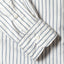 The barrel cuffs with two white buttons.