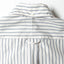 The back of the White Striped Japanese Poplin shirt with a locker loop and back button on the collar.