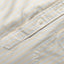 A close-up of the lined popover placket with white buttons.