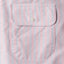A close-up of the button through chest pocket.