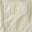 A close-up of the button through chest pocket.