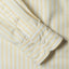 The barrel cuffs with two white buttons.