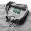 Close-up of the Grey Brushed Chambray sport shirt's button-down collar featuring a lined collar and classic button detail.