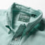 Close-up of the Teal Brushed Chambray sport shirt's button-down collar featuring a lined collar and classic button detail.