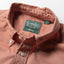 Close-up of the Burgundy Brushed Chambray sport shirt's button-down collar featuring a lined collar and classic button detail.