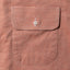 Close-up of the Burgundy Brushed Chambray sport shirt's chest pocket, showcasing the soft brushed chambray fabric and detailed construction.