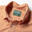 Close-up of the Orange Brushed Chambray sport shirt's button-down collar featuring a lined collar and classic button detail.
