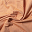 Close-up of the Orange Brushed Chambray sport shirt's brushed chambray fabric, showcasing its soft texture and rich orange color.