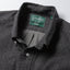 Close-up of the Charcoal Silk Denim sport shirt's button-down collar featuring a lined collar and classic button detail.