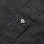 Close-up of the Charcoal Silk Denim sport shirt's button placket featuring classic buttons and smooth charcoal silk denim fabric.
