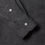Close-up of the Charcoal Silk Denim sport shirt's lined cuff and buttons, showcasing its smooth silk denim fabric.