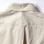 Back view of the Ecru Silk Denim sport shirt featuring its classic shirting construction, center back pleat, and ecru silk denim fabric.