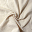Close-up of the Ecru Silk Denim sport shirt's silk denim fabric, showcasing its smooth texture and natural ecru color.
