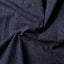 Close-up of the Indigo Silk Denim sport shirt's silk denim fabric, showcasing its smooth texture and rich indigo color.