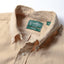 Close-up of the Tan 16-Wale Corduroy sport shirt's button-down collar featuring a lined collar and classic button detail.