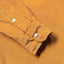 Close-up of the Gold 16-Wale Corduroy sport shirt's lined cuff and buttons, showcasing its fine-wale cotton corduroy fabric.
