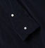 Close-up of the Navy 16-Wale Corduroy sport shirt's lined cuff and buttons, showcasing its fine-wale cotton corduroy fabric.