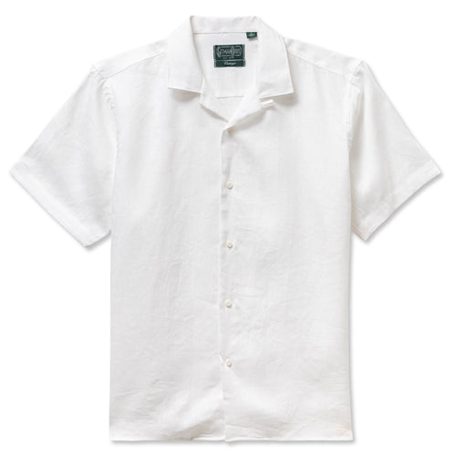 The White Linen Camp Shirt crafted from ultra-breathable linen for warm-weather comfort. Featuring a relaxed camp silhouette and airy weave, perfect for the hottest summer days. Made in the USA.