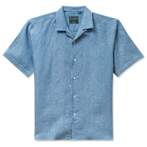 The Chambray Linen Camp Shirt crafted from breathable 100% linen with a chambray-like texture. Lightweight, crisp, and versatile, this warm-weather essential delivers effortless summer style. Made in the USA.