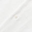The button on the placket on the White Linen Camp Shirt.