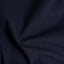 The texture of the fabric on the Navy Overdye Seersucker Camp Shirt.
