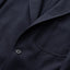 The Navy hopsack Simple Jacket with a button and chest pocket.