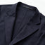 A closeup of the lapel of the Navy hopsack Simple Jacket.