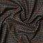 The texture of the grey checkered tweed simple jacket.