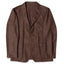 The Brown Donegal bouclé Simple Jacket made in the USA from Italian VBC merino wool. Unstructured and unlined with soft texture, patch pockets, notch lapel, horn buttons, and an easy, refined drape.