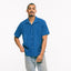 The Indigo Awning Stripe Camp shirt on the body of a model.