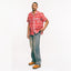 The Jamaica Bandana Madras Camp Shirt on a model with defined drape and style.