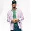 The Purple Ultralight Oxford button down shirt on body showing the drape on the body.