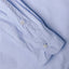 The sleeve on the Blue Zephyr Oxford shirt with two white buttons.