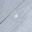 The button on the stitched placket on the Blue Stripe Linen shirt.