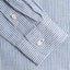 The sleeve on the Blue Stripe Linen shirt with two white buttons.