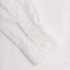 The sleeve on the White Seersucker shirt with two white buttons.