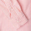 Orange and white button-down, 100% cotton, made in the USA, right sleeve, white button, buttoned cuff.