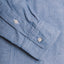 The Classic Chambray sleeve and cuff, two white buttons.