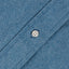 The light denim placket with a white button.