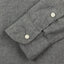The classic grey flannel sleeve with two white buttons.